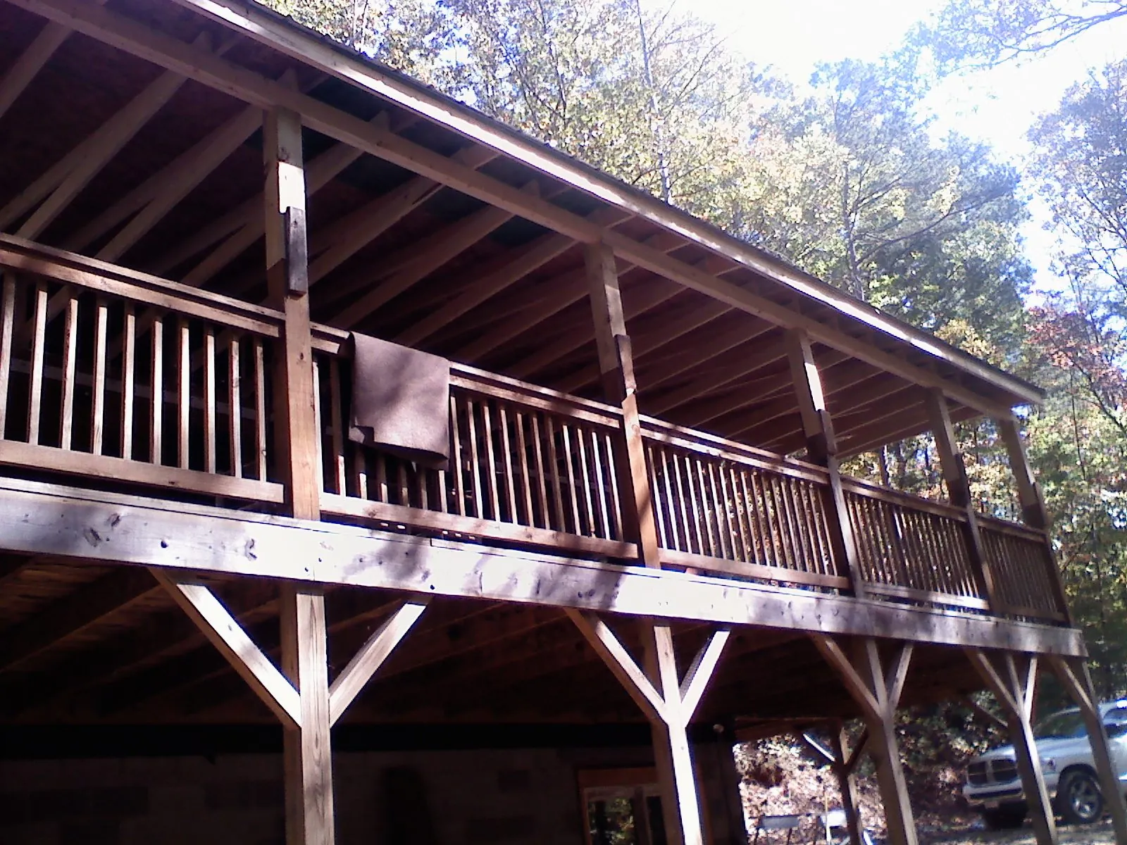 Timber framing under a new elevated porch and deck — Roof Leak Repair in Gas City by Roofing Brothers